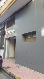 a car rental sign on the side of a building at Hotel Central Torrevieja in Torrevieja