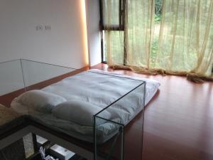 Letto o letti in una camera di 礁溪景觀溫泉會館