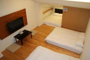 Letto o letti in una camera di 礁溪景觀溫泉會館
