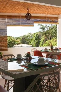 En balkon eller terrasse på Pousada Sol & Mar