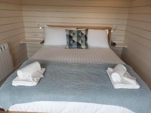Кровать или кровати в номере Toradh Cabin