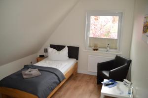 Letto o letti in una camera di Hotel Südstrand Amrum