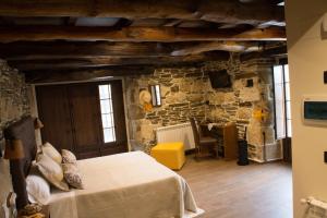 A bed or beds in a room at Casa Toirán