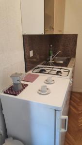 Kuchyňa alebo kuchynka v ubytovaní La Casa di Elisa