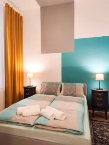 Кровать или кровати в номере Highlight Apartment Schönbrunn
