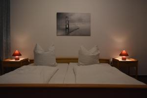 Ένα ή περισσότερα κρεβάτια σε δωμάτιο στο Hotel Restaurant Meints4you im Bürgerhof