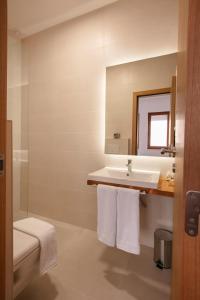 Koupelna v ubytování Grand Boutique Hotel + 44 fotografií
