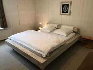 เตียงในห้องที่ Casa Margerita