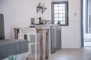 Kuchyň nebo kuchyňský kout v ubytování Theodora Suites