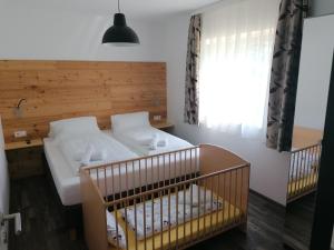 Posteľ alebo postele v izbe v ubytovaní Fischer Ferienhaus