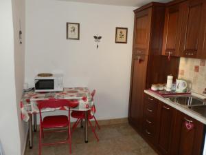 Duanita appartamenti tesisinde mutfak veya mini mutfak