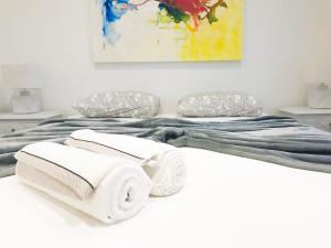 Un pat sau paturi într-o cameră la Kerart House
