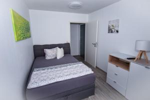 Postel nebo postele na pokoji v ubytování Dream, EP Tickets über uns erhältlich