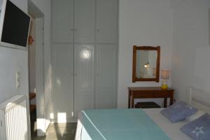Postel nebo postele na pokoji v ubytování Klados Studios & Apartments