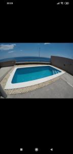 Bazén v ubytovaní Vivienda vacacional Vistamar alebo v jeho blízkosti + 15 fotografií