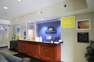 adrugstore with a doctors inn sign on the wall at Days Inn by Wyndham Manassas in Manassas