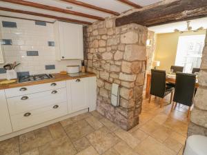 Kuchyň nebo kuchyňský kout v ubytování Rainforest Cottage + 19 fotografií
