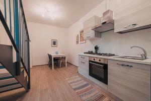 A kitchen or kitchenette at Casale di Nicolò