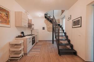 A kitchen or kitchenette at Casale di Nicolò