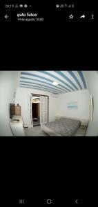 Una foto de un dormitorio con una cama en una habitación en Apart Hotel em Búzios, en Búzios