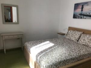 Posteľ alebo postele v izbe v ubytovaní Vivienda Vacacional Delia Castillo 5A