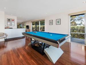 a living room with a pool table in it at Bella Vista in McCrae