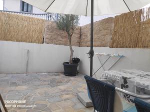 Patio alebo iná vonkajšia časť ubytovania Valentino