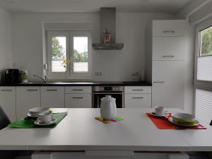 Kuchyň nebo kuchyňský kout v ubytování Ferienwohnung in der Mainleite für Zwei