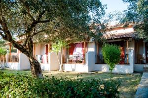 A garden outside Kalypso studio Resorts