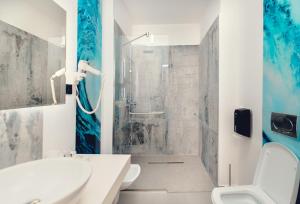 a bathroom with a shower and a sink and a toilet at Casa Del Sole in Alba Iulia +173 photos