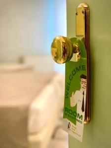 Rúm í herbergi á Piccolo Hotel Nogara