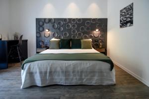 Кровать или кровати в номере Locanda Il Carugio