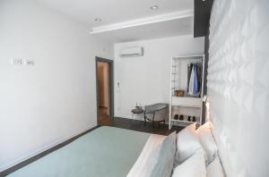 Кровать или кровати в номере Locanda Il Carugio