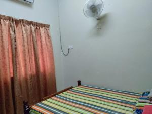 Fotografie z fotogalerie ubytování Kayu Merbau Homestay v destinaci Seri Iskandar