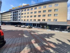 a large building with a lot of windows at Hotel Complex Ukraine in Lutsk