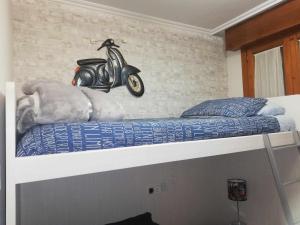 Łóżko lub łóżka w pokoju w obiekcie La casa del gatico