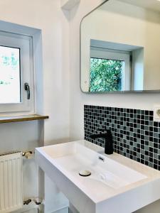 Salle de bains dans l'établissement Naabsuite