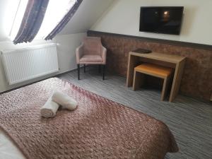 Posteľ alebo postele v izbe v ubytovaní Hotel Dolce Vita