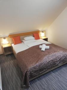 Posteľ alebo postele v izbe v ubytovaní Hotel Dolce Vita