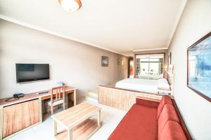 TV a/nebo společenská místnost v ubytování Hotel Beatriz Playa & Spa
