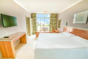 Postel nebo postele na pokoji v ubytování Hotel Beatriz Playa & Spa