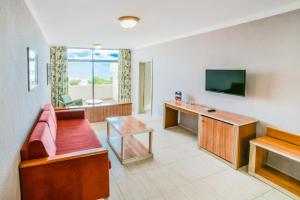 TV a/nebo společenská místnost v ubytování Hotel Beatriz Playa & Spa