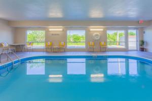 a large swimming pool in a hotel room at Wingate by Wyndham Gurnee in Gurnee
