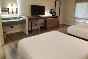 Cama o camas de una habitación en Wyndham Garden San Diego