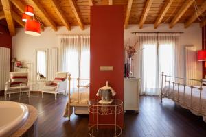 Postel nebo postele na pokoji v ubytování Hostal Los Canteros