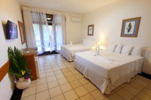 Katil atau katil-katil dalam bilik di Porto Seguro Praia Resort - All Inclusive