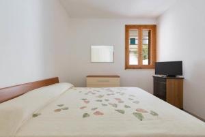 Postel nebo postele na pokoji v ubytování Casa Chiara