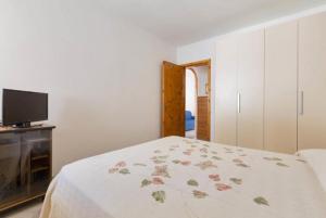 Posteľ alebo postele v izbe v ubytovaní Casa Chiara