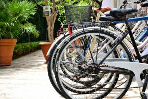 a group of bikes parked next to each other at B&b Mondello Resort in Palermo