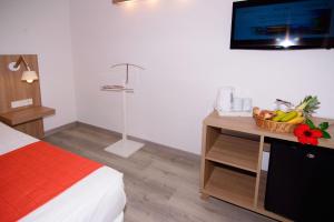 Cama o camas de una habitación en Cala Llenya Resort Ibiza